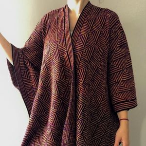 Poncho with sleeves